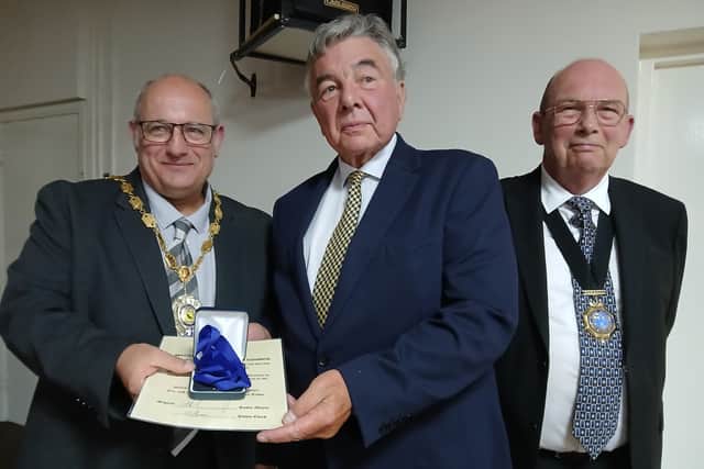 Michael Pinches, who recently stepped down after serving for many years as chairman of the Market Drayton Community Amateur Sports Club, was honoured. Photo: Market Drayton Town Council