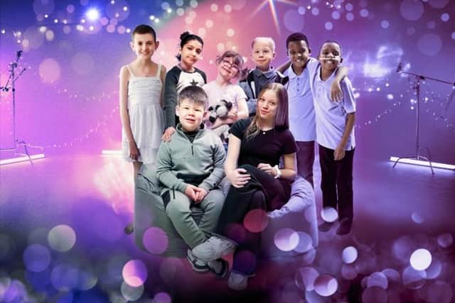 Dulcie (pictured third from left) with fellow children featured in the Kids Like Us film