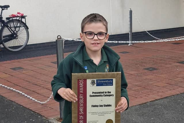 Finlay with his award from the Mayor