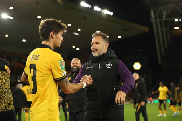 Vitor Pereira embraces Hugo Bueno following Wolves' Carabao Cup triumph over Everton on Tuesday