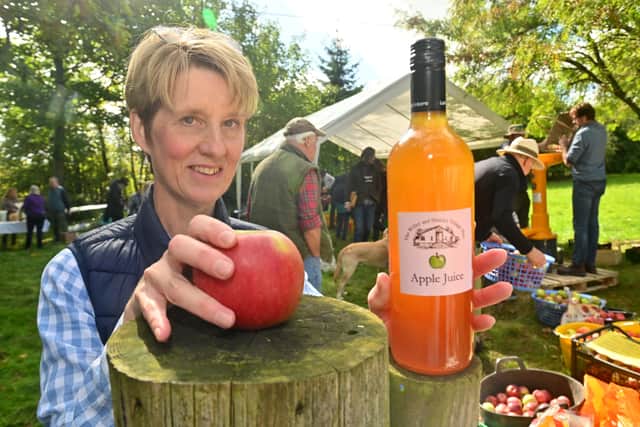 Willey Village Hall , near Broseley, and the annual Apple Press day where people can bring there apples to be turned into juice. Lisa Grace from Broseley.