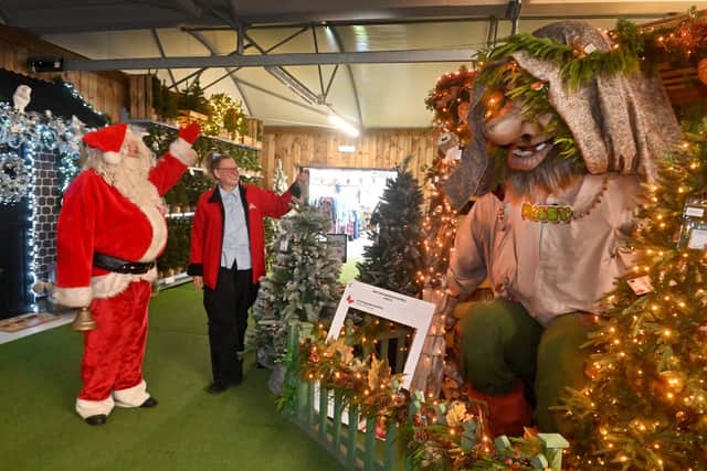 Assistant Manager Sarah Davies with Santa