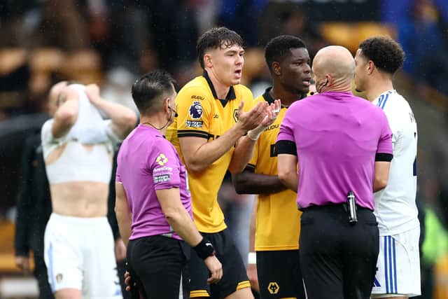 Jorgen Strand Larsen protests to referee Anthony Taylor (Photo by Dan Istitene/Getty Images)