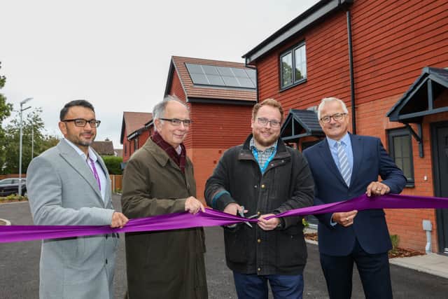 Harpreet Rayet, Managing Director of STAR Housing; Tony Deakin, Chair of the STAR Housing Board; James Owen, Portfolio Holder for Housing and Leisure at Shropshire Council; and Stewart Mackenzie, Construction and Contracts Director at McPhillips Ltd, mark the official opening of School Grove’s new homes with a ceremonial ribbon cutting.