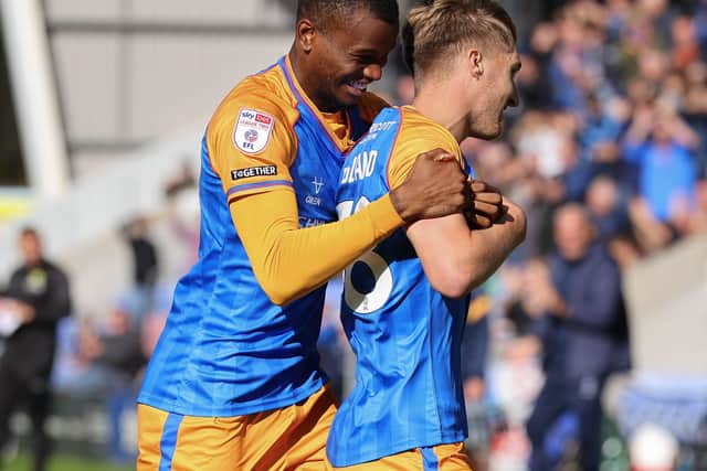 Bradley Ihionvien congratulates Isaac England after his assist