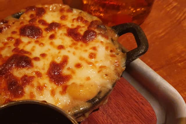 Cheesy and very tasty, with soft brisket underneath