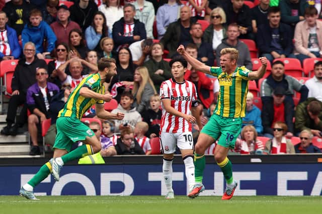 Heggebo celebrates with Nat Phillips during a victory at Stoke (Photo by Nathan Stirk/Getty Images)