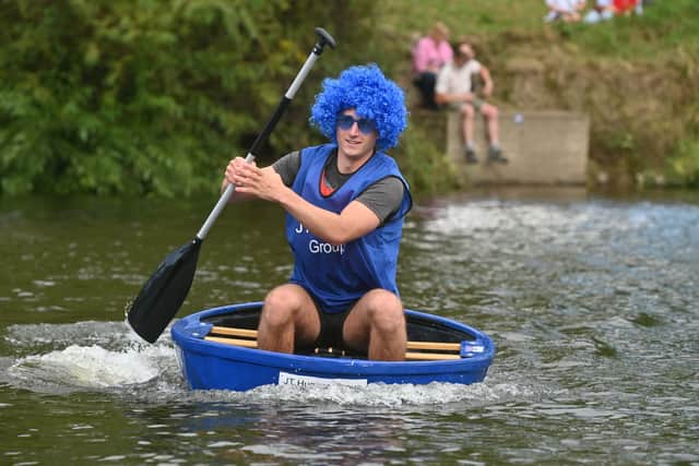 Blue is the colour, coracle racing is the game for this competitor