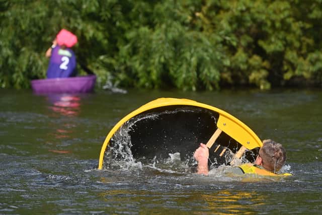A racer capsizes into the River Severn