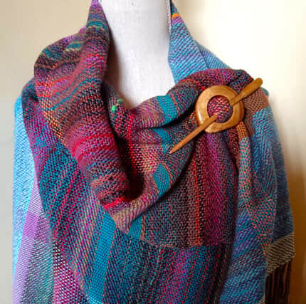 A hand woven shawl by Sue Wright of Woollen Tree will be on display