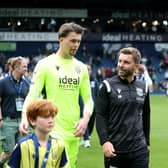 James Morrison with goalkeeper Josh Griffiths after the final match of last season, a period where popular former playing hero Morrison oversaw two matches in caretaker charge. (Photo by Adam Fradgley/West Bromwich Albion FC via Getty Images)