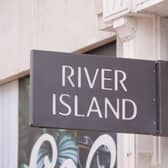 River Island has unveiled a restructuring plan which will see it shut 33 shops (Mike Egerton/PA)