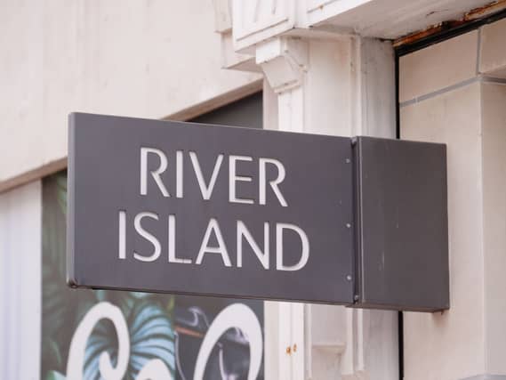 River Island has unveiled a restructuring plan which will see it shut 33 shops (Mike Egerton/PA)