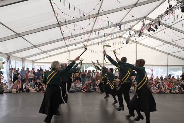 The audience in thrall of dancers on stage at Shrewsbury Folk Festival: Photo: John Hooper