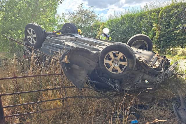 In Pictures: Car ends up on its roof in a hedge after crash near ...