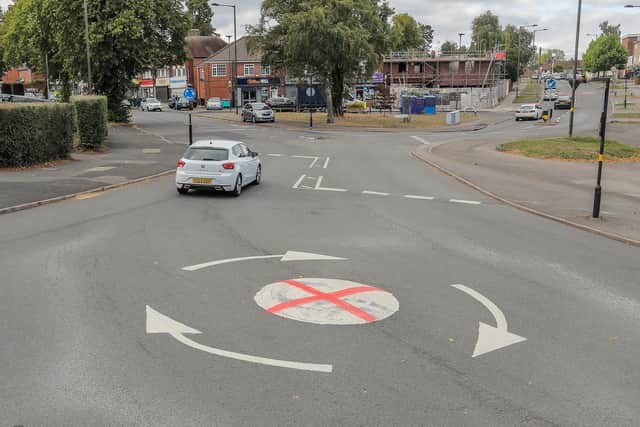Roundabout at the junction of Haunch Lane and Warstock Lane which has been painted with a St George's Flag. Fuming Brummies have taken the flag row to the streets by painting the St Georgeâs Cross on mini-roundabouts across the city. It comes as residents have hit out after Birmingham City Council in announced English flags hoisted from lampposts would be removed. The Union Jack and St George's flags were raised by locals as part of a movement online called Operation Raise the Colours. Council chiefs sparked fury when they ordered the flags to be ripped down, saying the "unauthorised items" are "dangerous" and could potentially kill motorists and pedestrians. 
