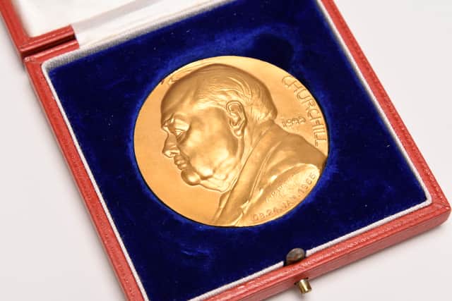 A 22ct gold Winston Churchill commemorative medallion which sold for £6,700