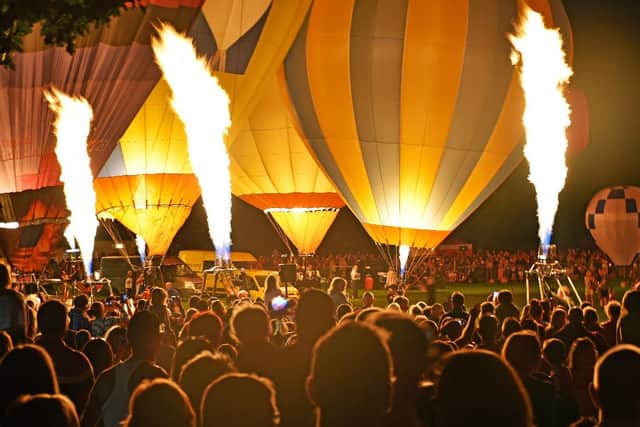The night glow lights up Oswestry Balloon carnival. Photo: Graham Mitchell
