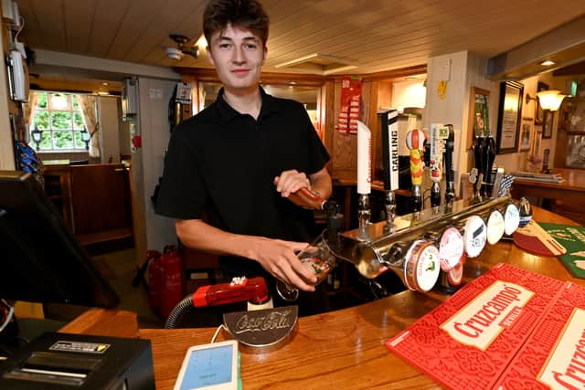 Finn Mockett is part of the team working hard to welcome people