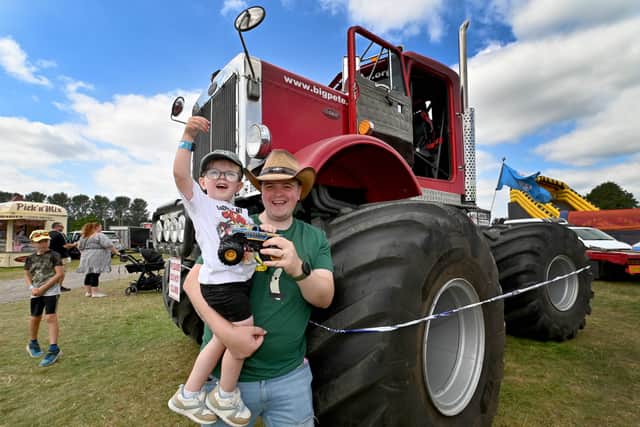 Hayden Williams and son Noah, aged two, meet Big Pete the monster truck.