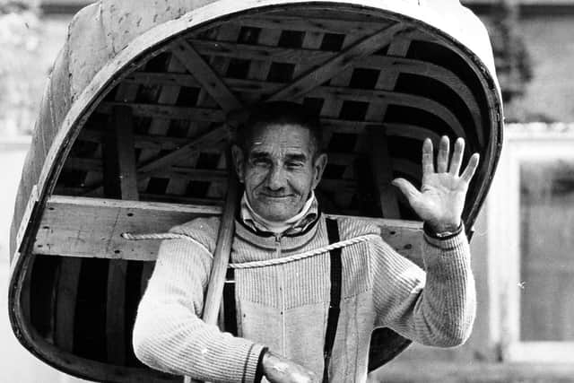 Fred Davies with one of his coracles. The Coracle Society is holding a race in his memory on the River Severn near where Shrewsbury Town's old Gay Meadow stadium was. Fred used to fetch footballs in his boat after the players booted them out of the ground