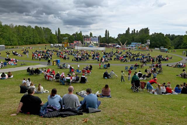 England fans watch the big match on the giant screen at Telford Town Park