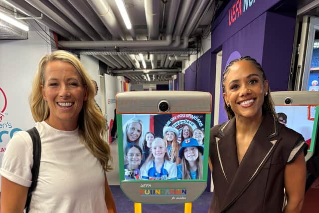 The Bridgnorth Spartans players met Rachel Brown-Finnis (left) and Alex Scott through the robot