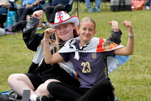England fans watch the big match on the giant screen at Telford Town Park