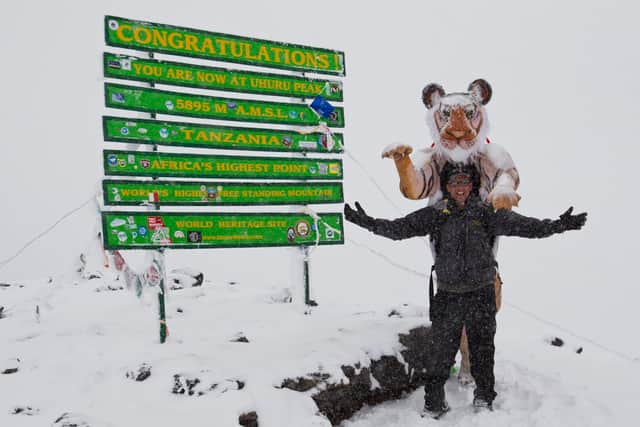 Paul Goldstein at summit of Kilimanjaro. Photo: Paul Goldstein/SWNS