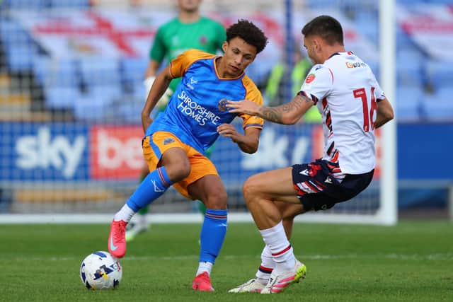 Will Gray in action for Salop against Bolton