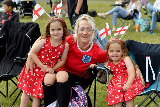 England fans watch the big match on the giant screen at Telford Town Park