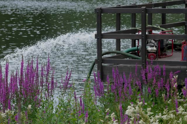 One of the pumps putting life back into the water at Llandrindod Wells lake. Image by Andy Compton