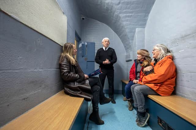 Officer Goodwin leading a tour of the prison