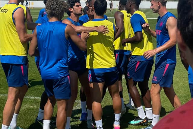  Wolves players playfully argue who was victorious in the five-a-side game 