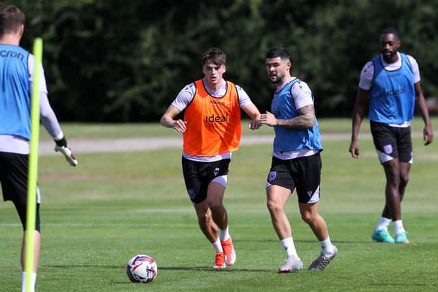 Alex Williams, left, battles with Alex Mowatt (Photo by Adam Fradgley/West Bromwich Albion FC via Getty Images).