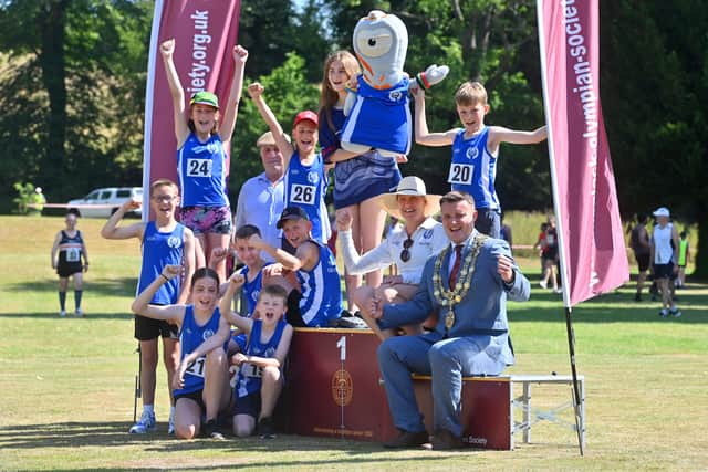 Marcus Themans, Camilla Stewart and mayor Dan Thomas with youngsters: Harrison, 11; Eva, 13; Cian, nine; Maja, 12; Jack, 15; Harry, 10; Eryk, nine; Emily, 14 and Fionn, 11
