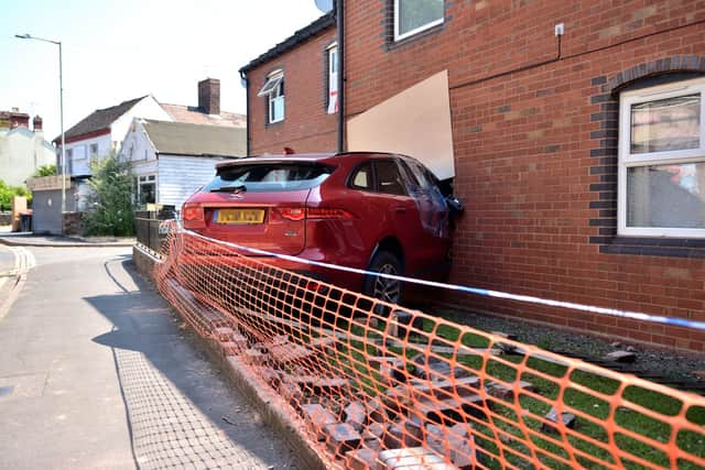 The vehicle was left wedged in the house
