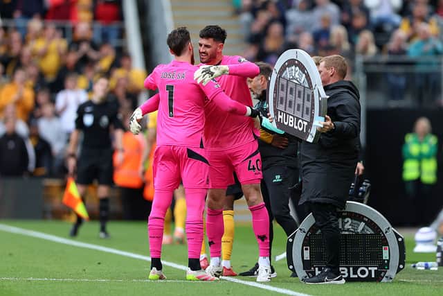 Jose Sa of Wolverhampton Wanderers embraces with Tom King of Wolverhampton Wanderers as he is substituted (Photo by Cameron Smith - WWFC/Wolves via Getty Images)