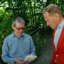 Geologist Graham Worton shows Michael Portillo a Dudley Bug trilobite fossil at Wren's Nest