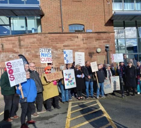A protest was held outside The Guildhall in Shrewsbury to try and save the Shropdoc out-of-hours GP service. Picture: LDRS