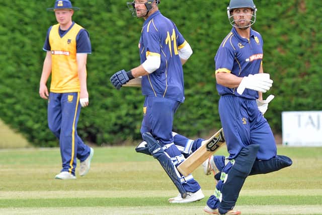 Left , Tom Whitney and Iftikhar Khan help a Shropshire CCL representative side see off Shropshire CCC at Wellington.