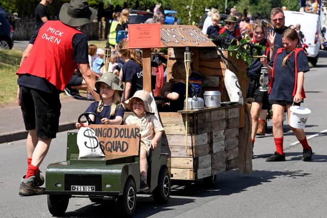 The Gamble family with their I'm A Celeb inspired Dingo Dollar kiosk on wheels
