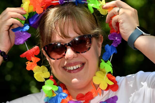 Rachel Cruickshank from the Co-op with a flower garland