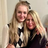 Lily-May Vaughan getting a hug from mum Leanne