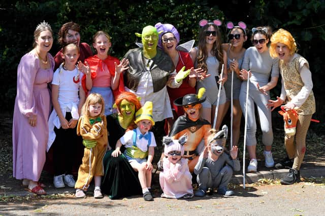 Members of the Shrek-themed Far Far Away float, which won Best Float at the carnival