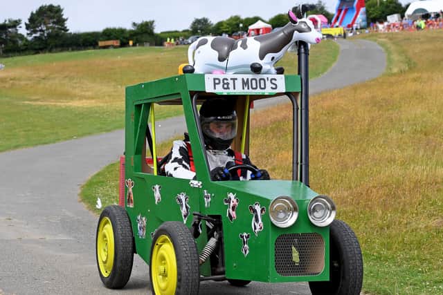 P&T Moo's with their tractor kart, complete with cow on the roof