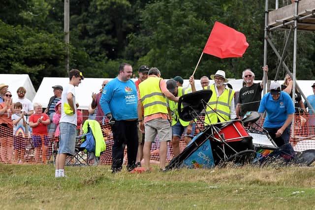 Going, going, gone! A competitor crashes near the crowd