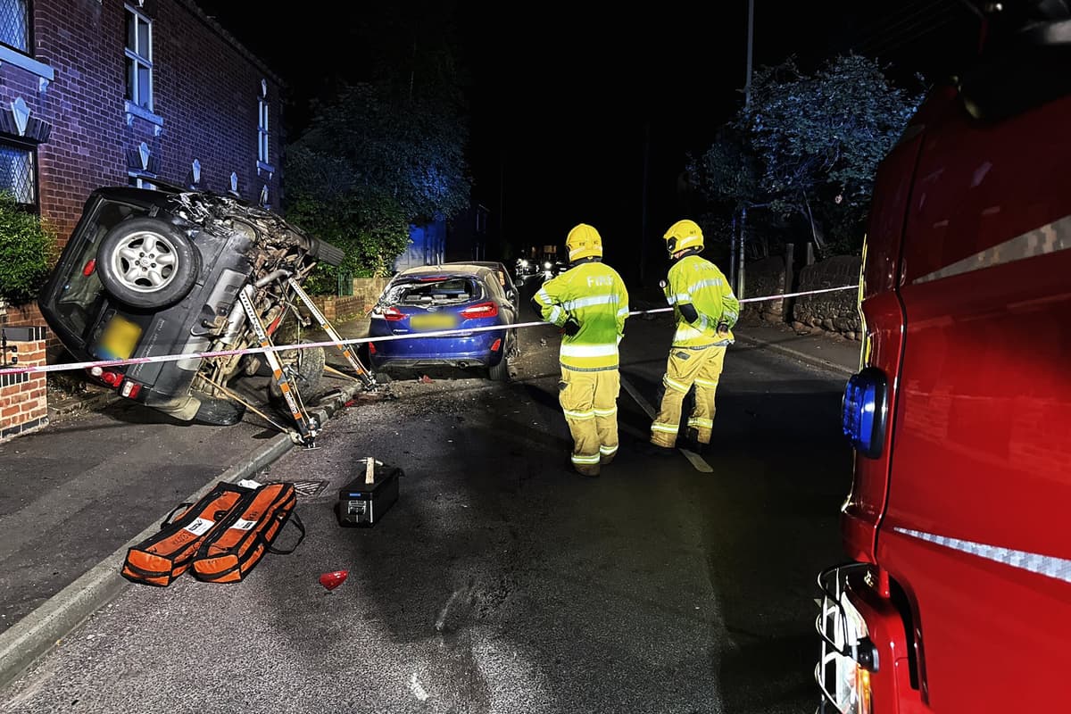Land Rover Crash Chasing Land Rover left teetering 'precariously' on its side close to several ...