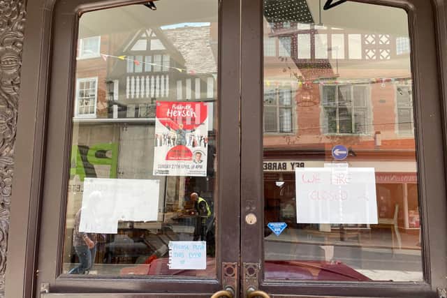 There is a sign in the window to let customers know. Photo: National World