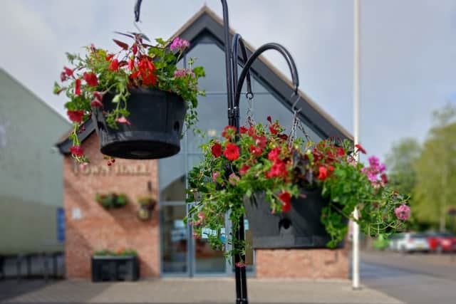 The town council provides 77 baskets, 29 mangers and 35 pole tops throughout the town. Picture: Market Drayton Town Council.